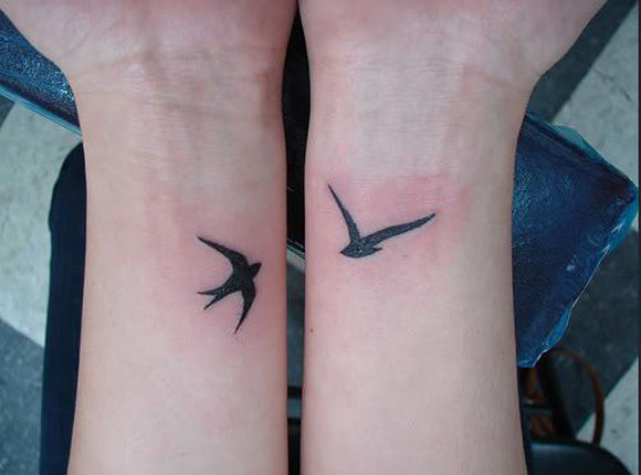 Simple Bird Tattoo On Wrist A great wrist tattoo.